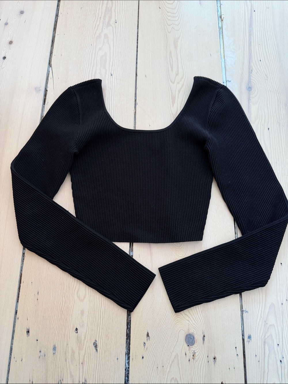Babaton Black Ribbed Off-the-Shoulder Crop Sweater